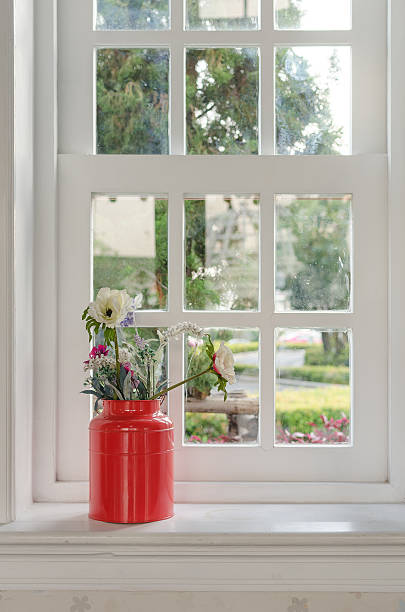 istock vase of flower with window frame 535540875