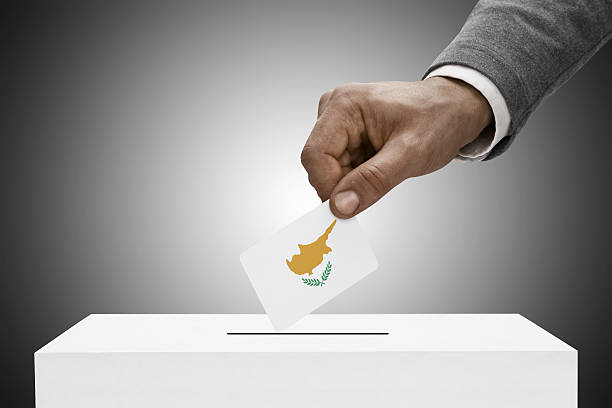 Black male holding flag. Voting concept - Republic of Cyprus stock photo