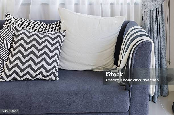 Black And White Pillows On Blue Sofa In Living Room Stock Photo - Download Image Now