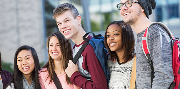 Group of students standing in a row outdoors