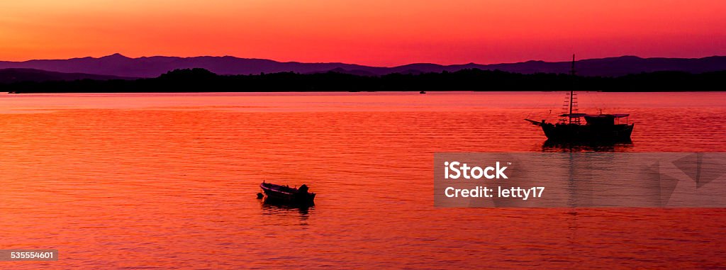 sunset sea boat Greece. Coast. Sunset. 2015 Stock Photo