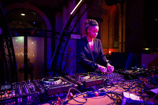 female DJ performing