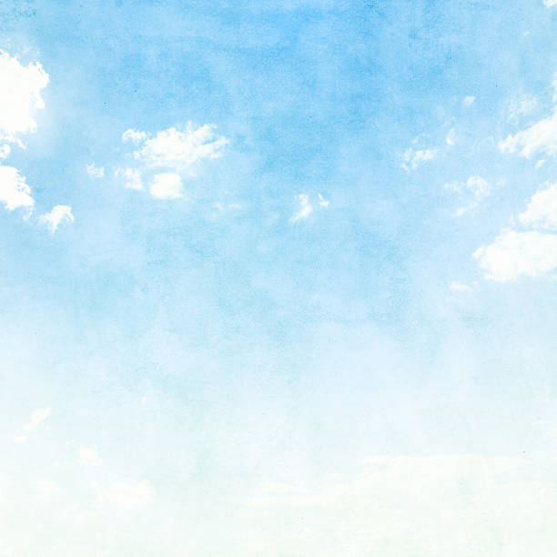 istock Blue sky with clouds in grunge style. 535557056
