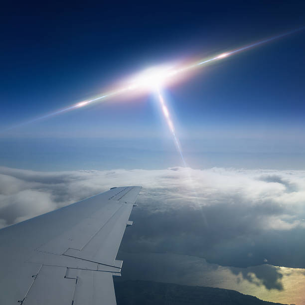 Ufo flies near airplane Abstract scientific background - flying craft piloted by aliens approaches to aircraft, ufo flies near airplane wow airlines stock pictures, royalty-free photos & images