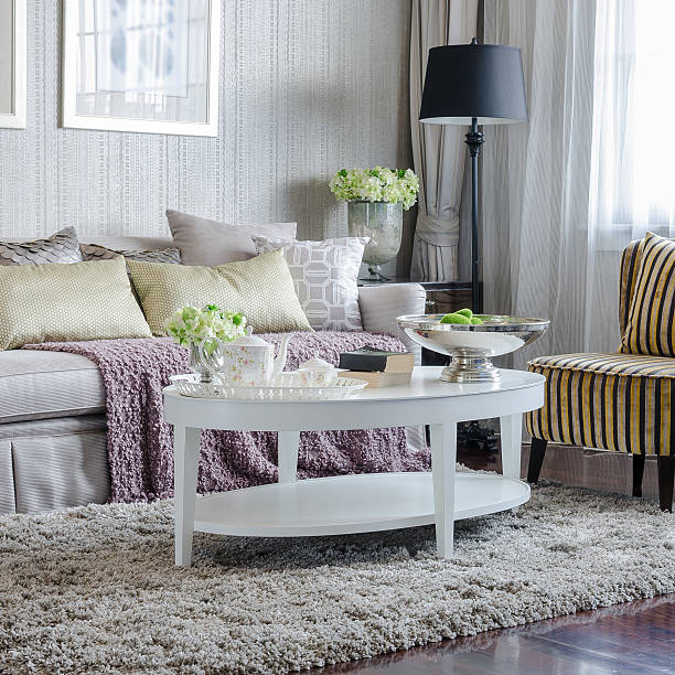 istock luxury living room with sofa and white table on carpet 535558213