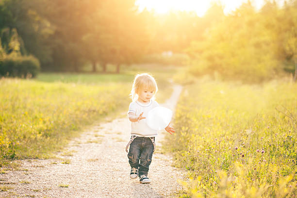 istock Cute little boy with balloon 535559208
