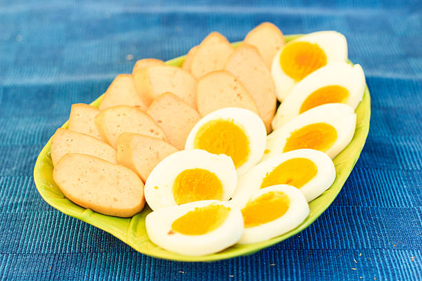 istock boiled sausages and egg on plate 535559307