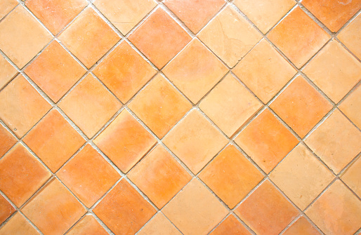 The squre clay floor tile background .