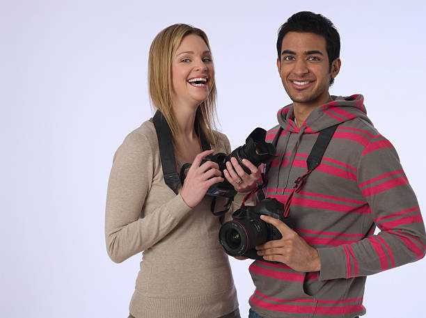 istock Young Photographers With Cameras 535560445
