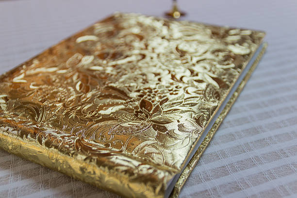 istock book with golden hardcover 535568257