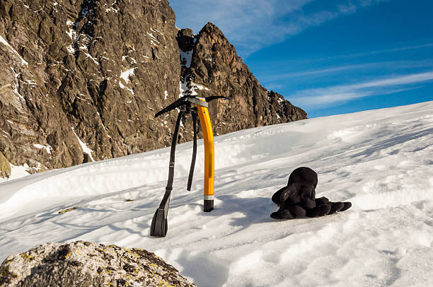 istock Ice axe and Gloves in the Snow 535568921
