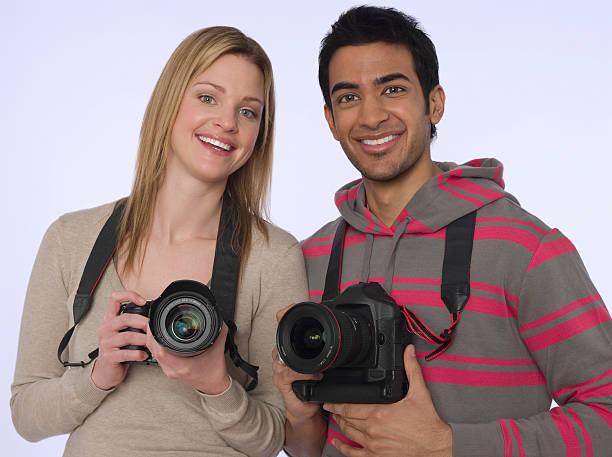 istock Young Photographers With Cameras 535569811