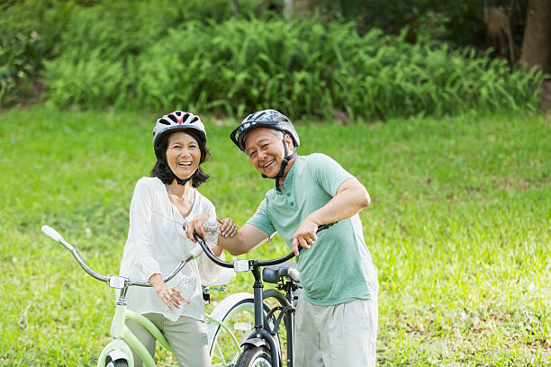 istock Senior couple riding bicycles 535571023