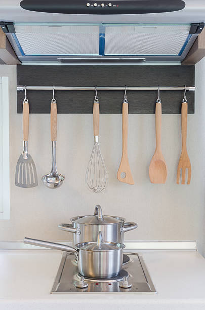 istock stainless pan on gas stove with hood 535571911