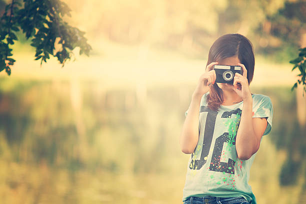 istock Pretty photographer girl 535572527