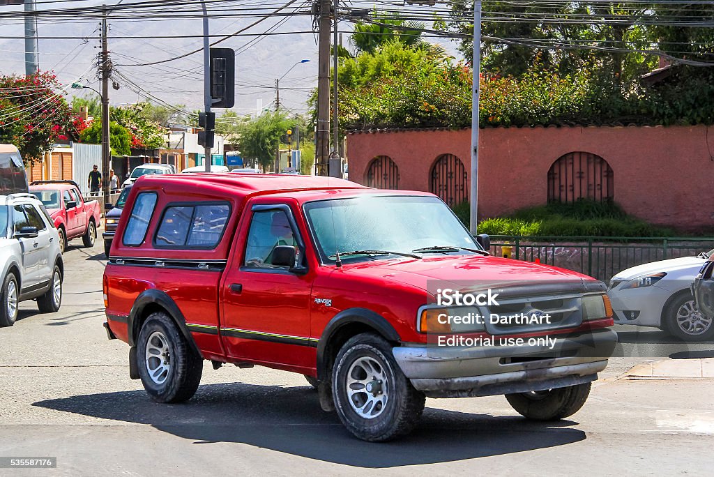 Ford Ranger Copiapo, Chile - November 14, 2015: Red pickup truck Ford Ranger drives in the city street. Covering Stock Photo