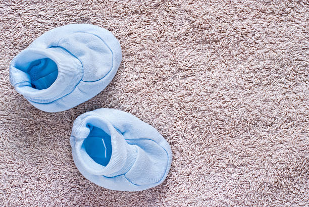 istock Pair of blue baby shoes 535596670