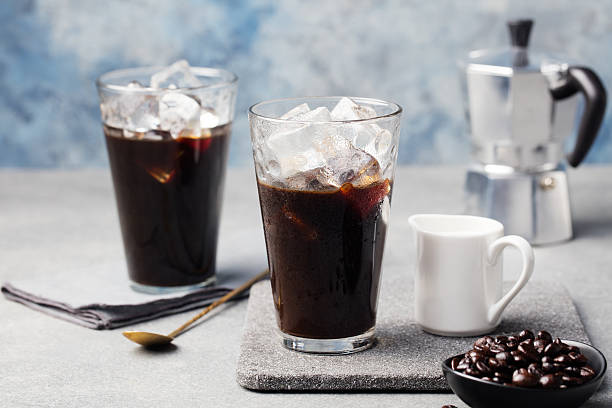 istock Ice coffee in a tall glass and coffee beans 535616552