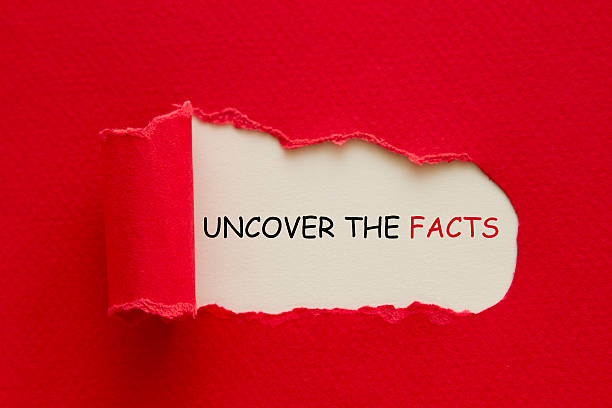 istock Uncover the facts written behind torn paper 535617422