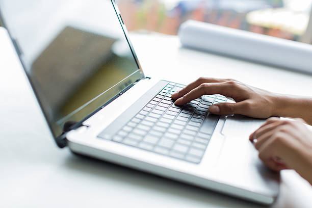 istock Young woman working on laptop 535624797