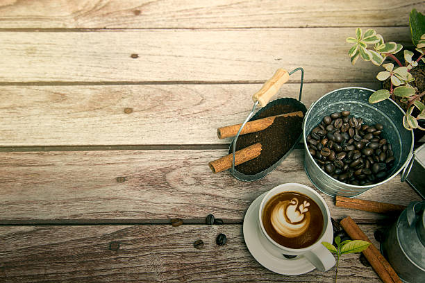 istock Cup of coffee with coffee bean and cinnamon 535625796