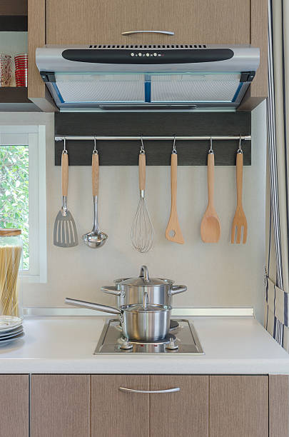 istock stainless pan on gas stove with hood 535625979