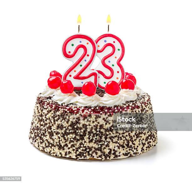 Birthday Cake With Burning Candle Number 23 Stock Photo - Download Image Now - 20-24 Years, Anniversary, Number 23