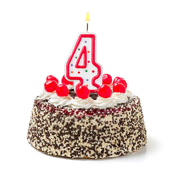 istock Birthday cake with burning candle number 4 535627455