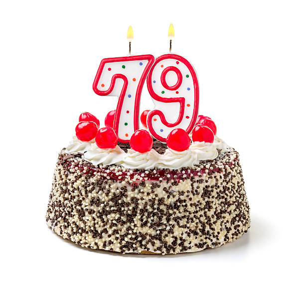 istock Birthday cake with burning candle number 79 535628477