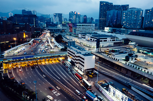 A busy toll plaza during the evening, Hong Kong. 