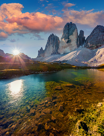 Colorful summer sunrise on the lake Rienza - Ursprung in National Park Tre Cime di Lavaredo. Dolomites, South Tyrol. Location Auronzo, Italy, Europe.