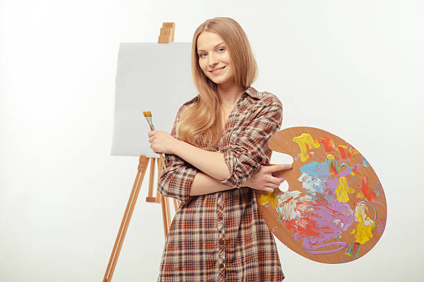istock Young beautiful artist creating a masterpiece 535630169