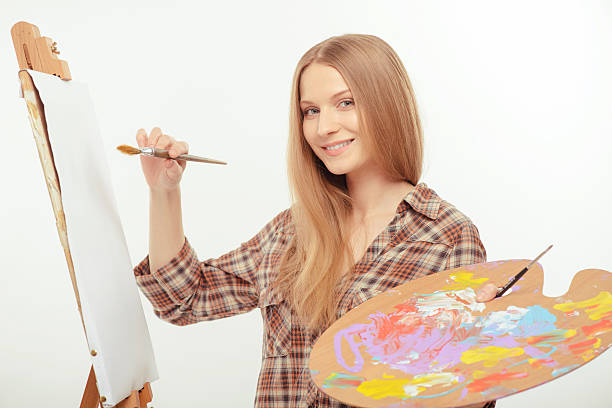 istock Young beautiful artist creating a masterpiece 535630175