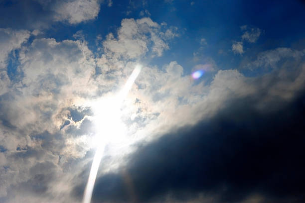 istock Blue sky and heavy clouds and the sun behind 535631779