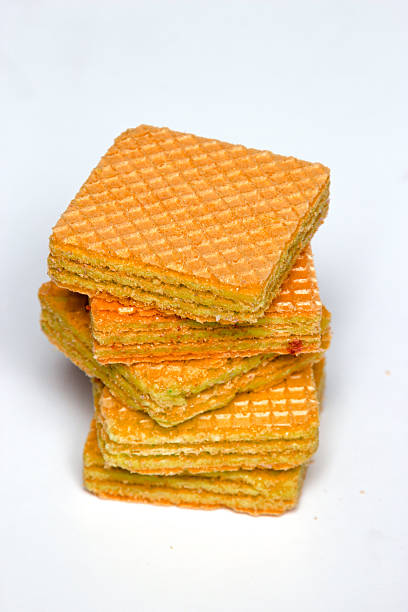 istock orange color wafer on white background 535672855