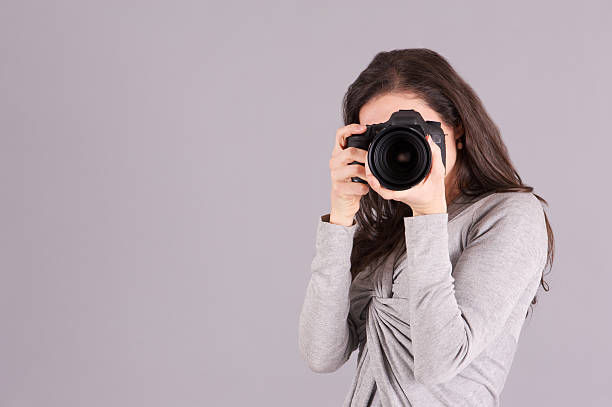 istock male photographer 535674373