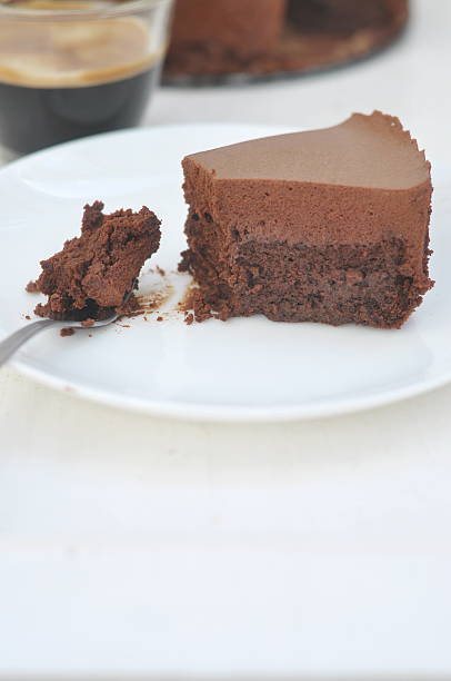 istock Chocolate cake with chocolate mousse, selective focusChocolate cake with chocolate mousse, selective focus 535674457