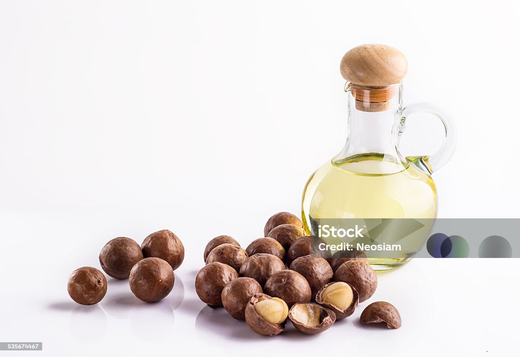 Macadamia oil Macadamia oil isolated on white background Macadamia Nut Stock Photo