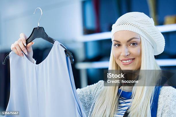 Young Woman In Retail Store Looking At Camera Stock Photo - Download Image Now - 2015, Adult, Adults Only