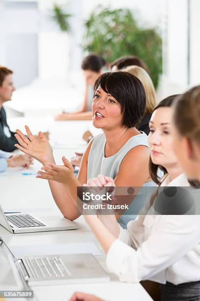 Group Of Businesswomen At Meeting Stock Photo - Download Image Now - Job Fair, Adult, Cooperation