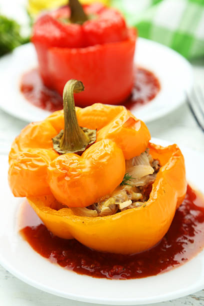 istock Red and yellow peppers stuffed with meat, rice and vegetables 535676239