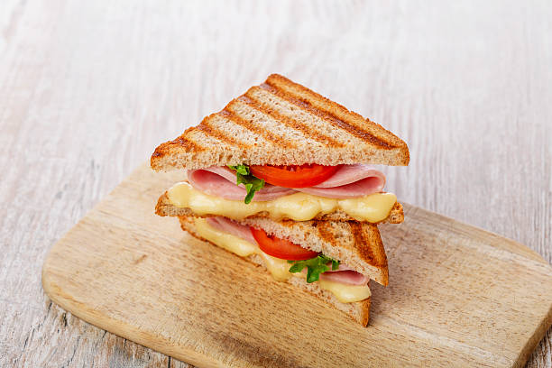 istock toast sandwich grilled ham with cheese and tomatoes 535677259