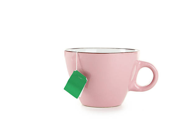 istock Cup of tea with tea bag isolated on white 535677603