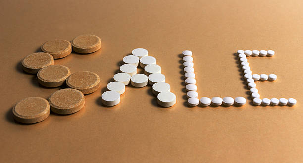 istock pills forming the word SALE 535682575