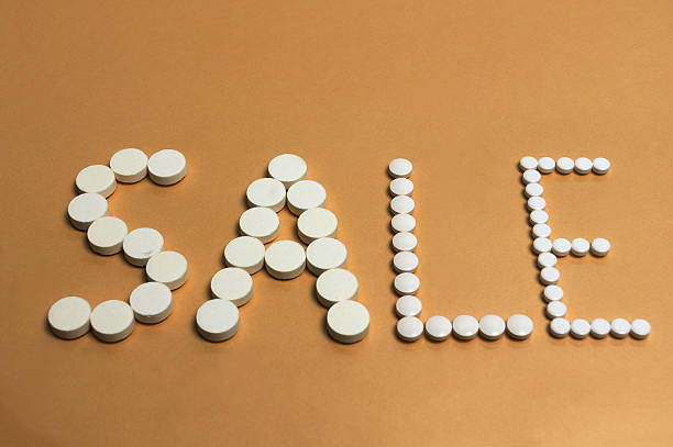 istock pills forming the word SALE 535682583