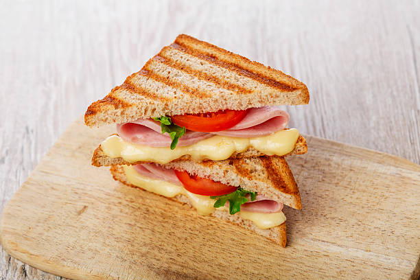 istock toast sandwich grilled ham with cheese and tomatoes 535695433