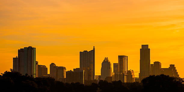 istock Austin Glowing Gold Cityscape Solid Orange Colors in the Sky 535695579