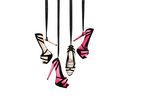 Women's Pump Shoes Hanging using Ribbons stock photo