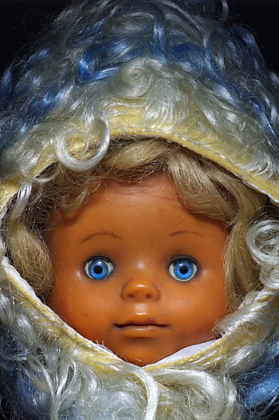 istock doll old toy portrait 535696047