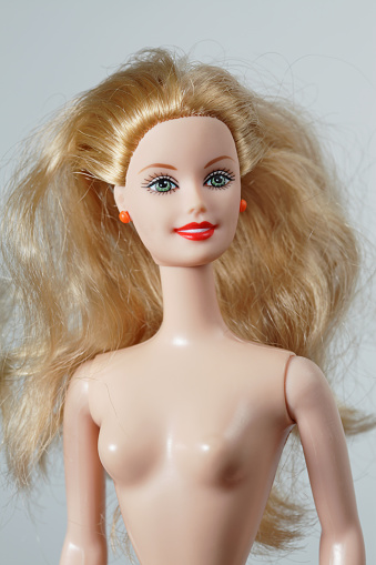 Brooklyn, NY, USA - February 2, 2015: One female Barbie doll made by the company Mattel photographed in studio. This Barbie doll is copyright 1991 by Mattel and made in Indonesia.